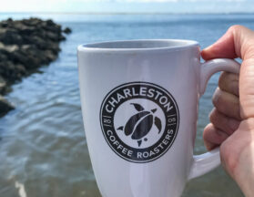 Charleston Coffee Roasters Logo Mug at the beach