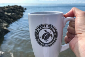 Charleston Coffee Roasters Logo Mug at the beach