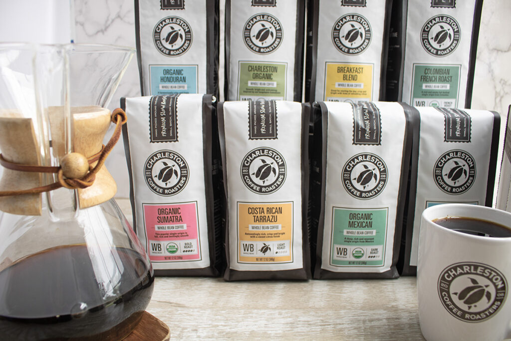 Charleston Coffee Roasters Bagged Coffees Chemex in foreground with Logo Mug